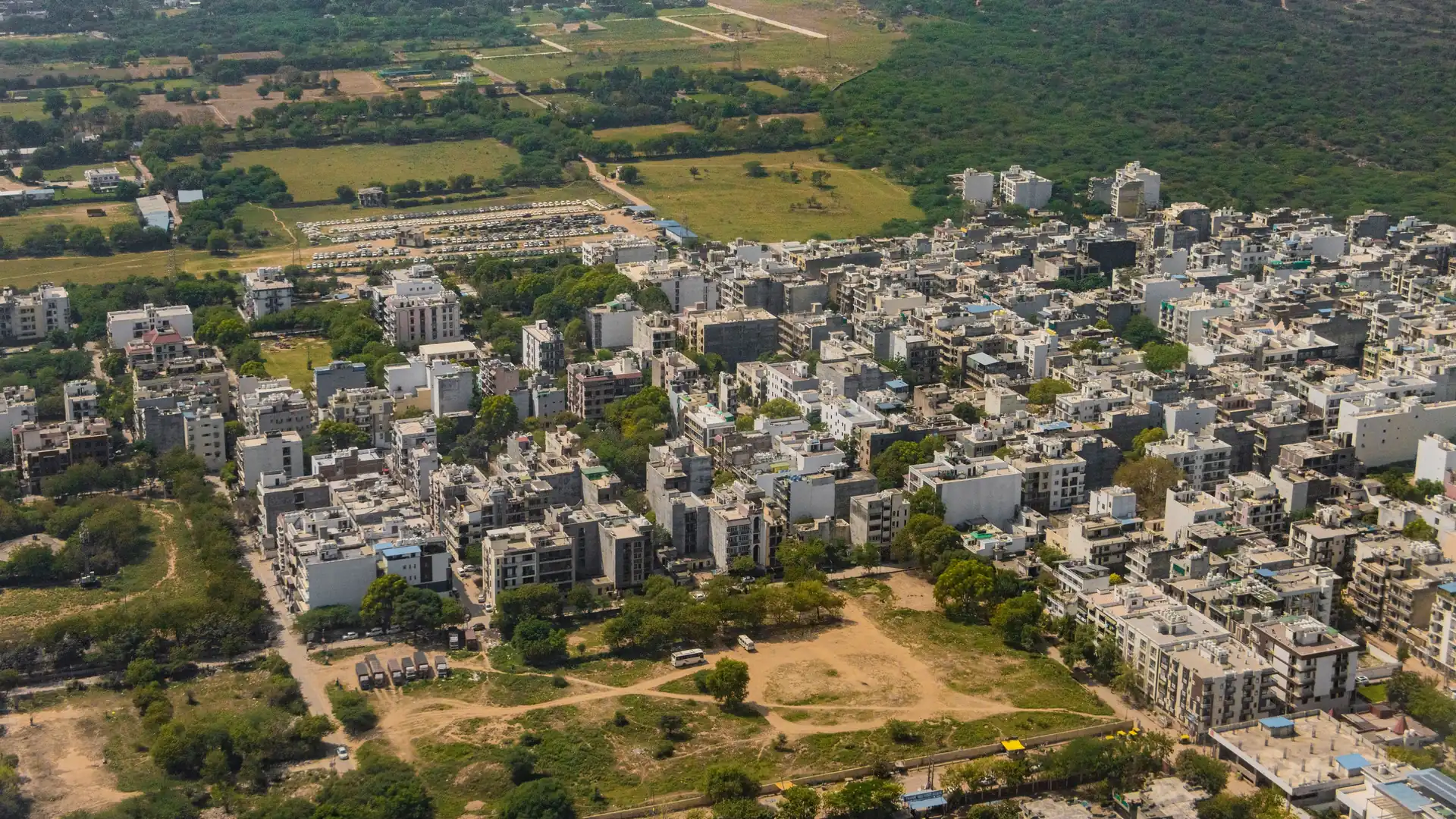 Gurugram from the air: low-rise blocks among trees